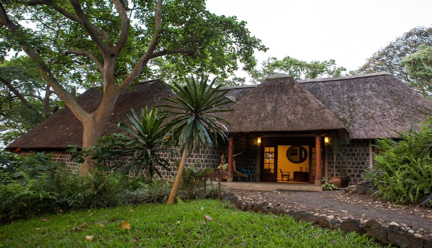 The main entrance into Mikeno Lodge with gardens