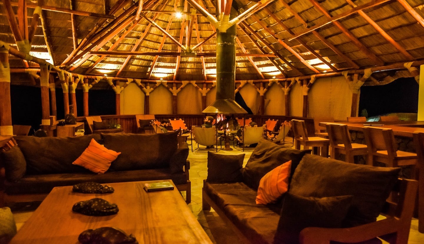 Fire pit, lounge and bar at Kibumba Camp