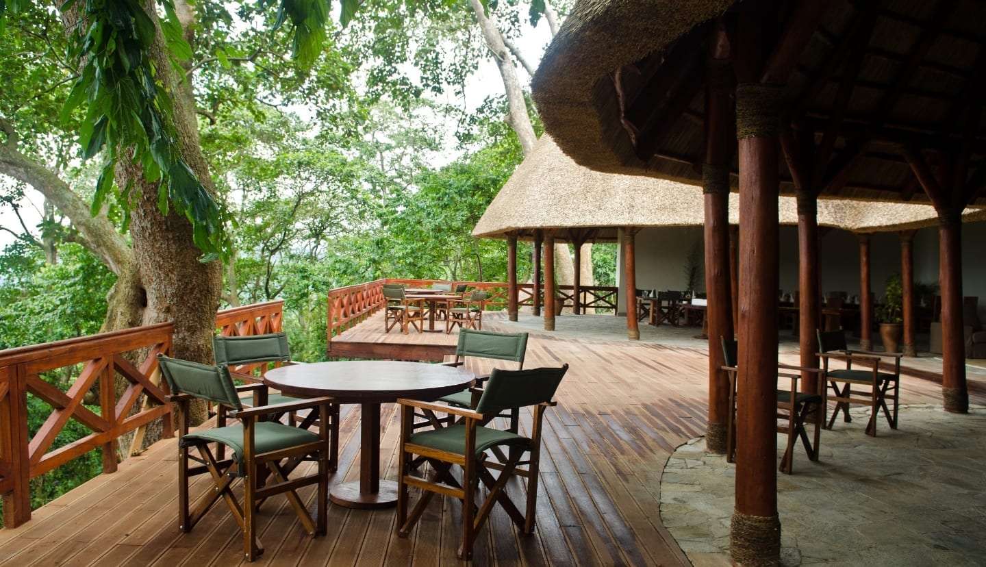 the deck at the bar of Mikeno Lodge by day