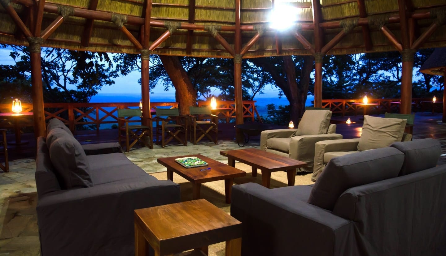 The deck at the bar of Mikeno Lodge at night