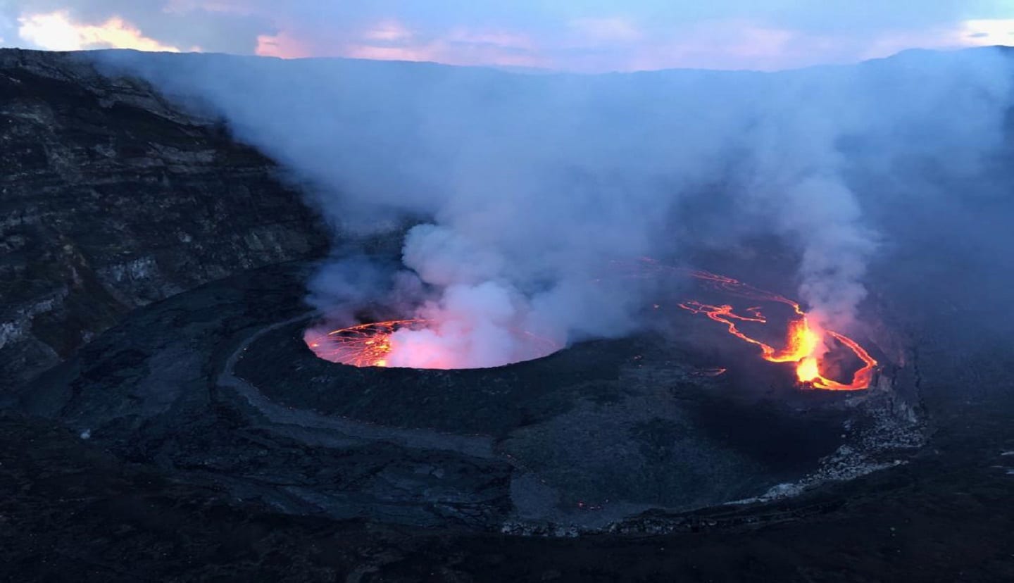 Nyiragongo lava lake and rivers glowing in the evening
